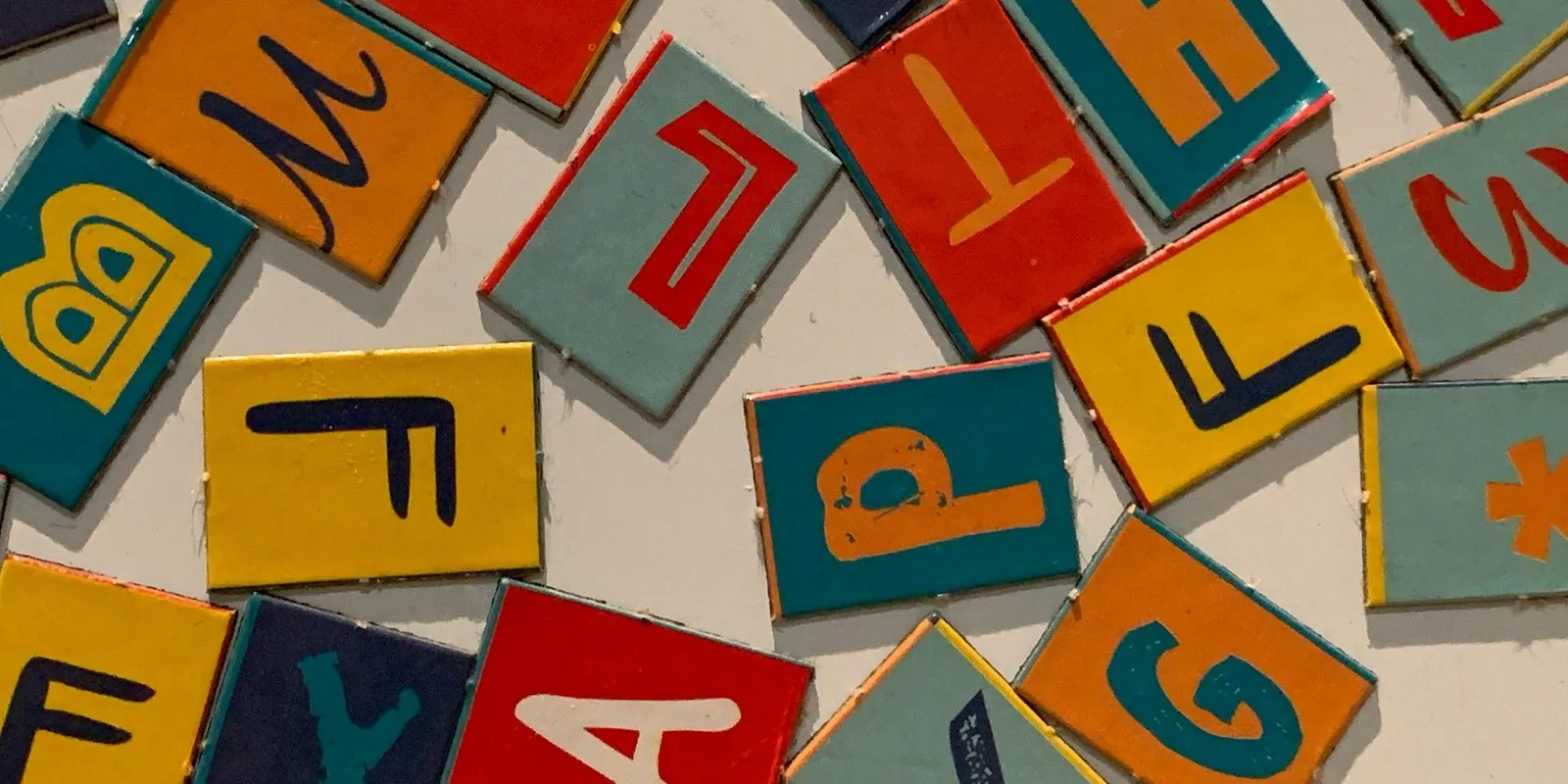 surendran-mp-IhWYiwSxm8g-unsplash LETTERS jumbled letters of the alphabet